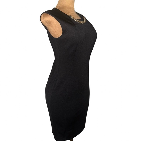 CALVIN KLEIN
Pre-loved Black Dress with Chain Accent💕
Size: 8 - Picture 3 of 10